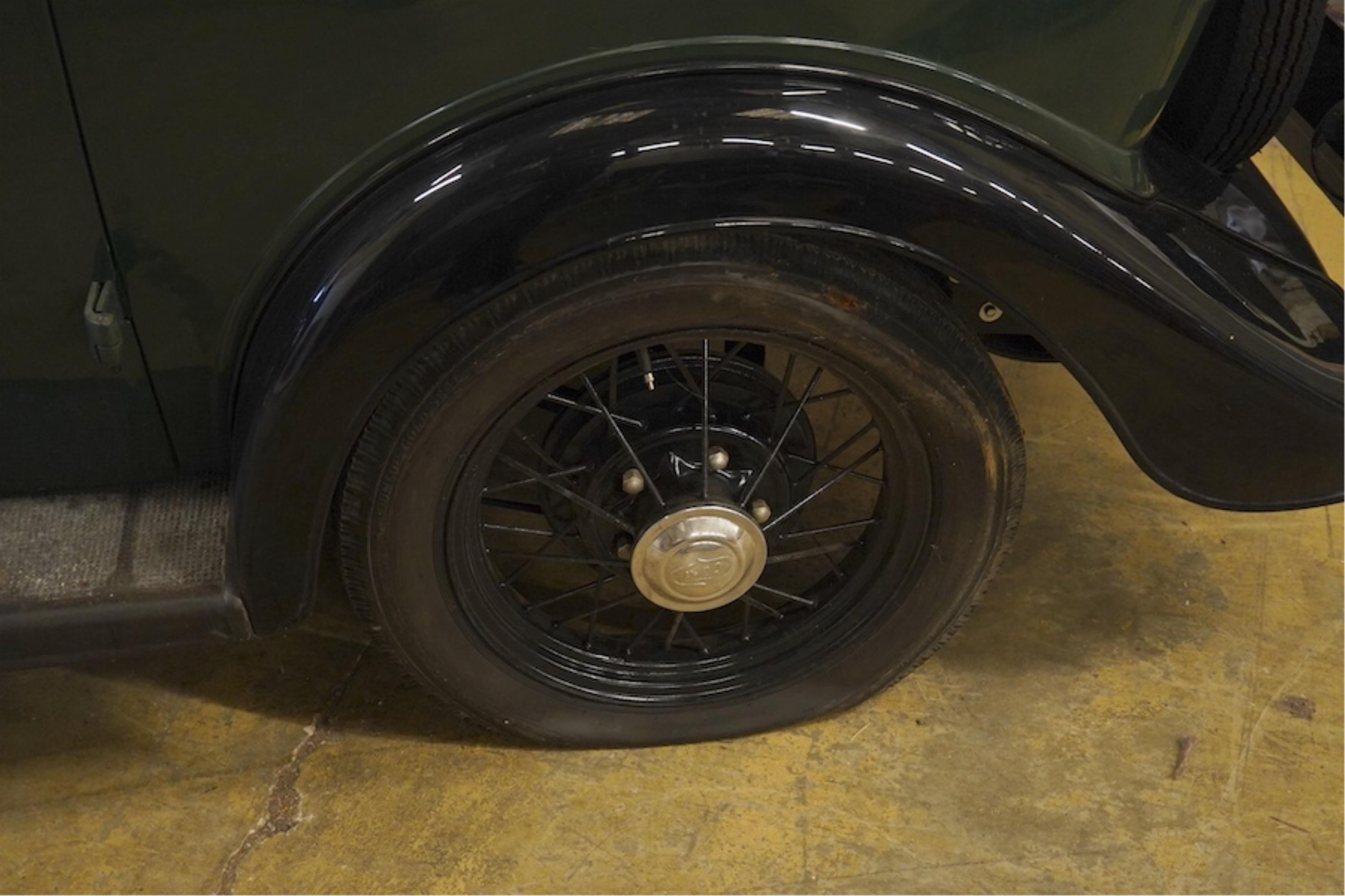 A 1936 Ford Model Y saloon, reg. no. CYM868, 885cc, dark green, odometer showing 93,057 miles. Restored by the late owner, to a very high standard and winner of seven Concours d’Elegance awards